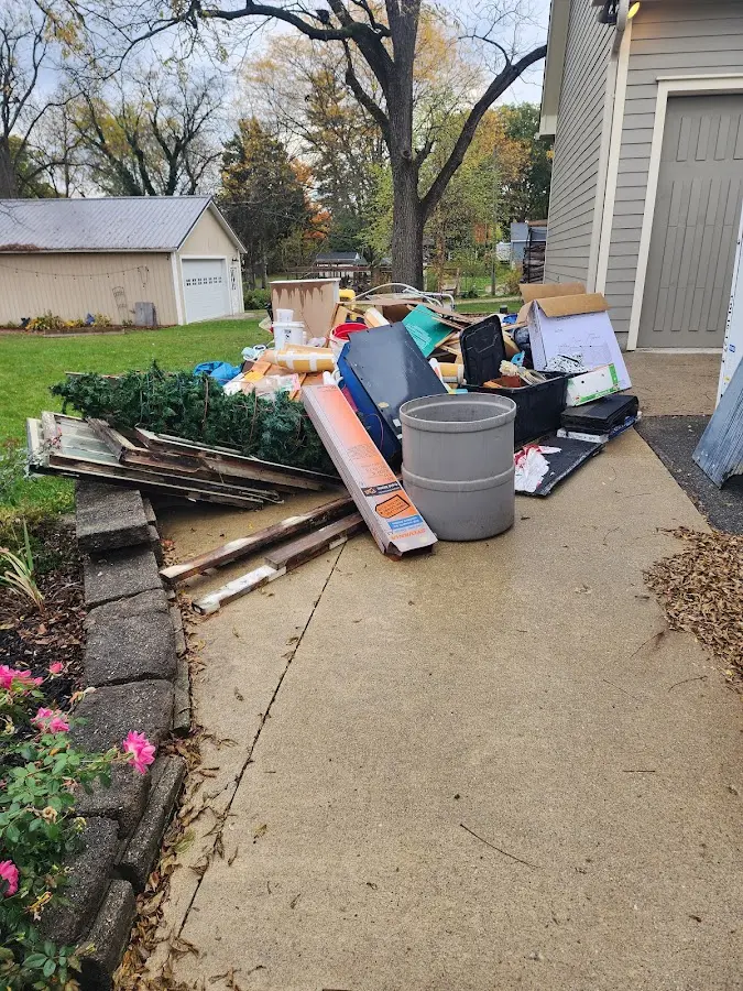 Dumpster being loaded with debris for 30 Yard Dumpster Rental in Bear Valley Springs